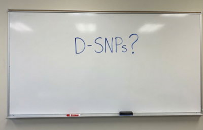 whiteboard with D-SNPs? Written in blue ink.